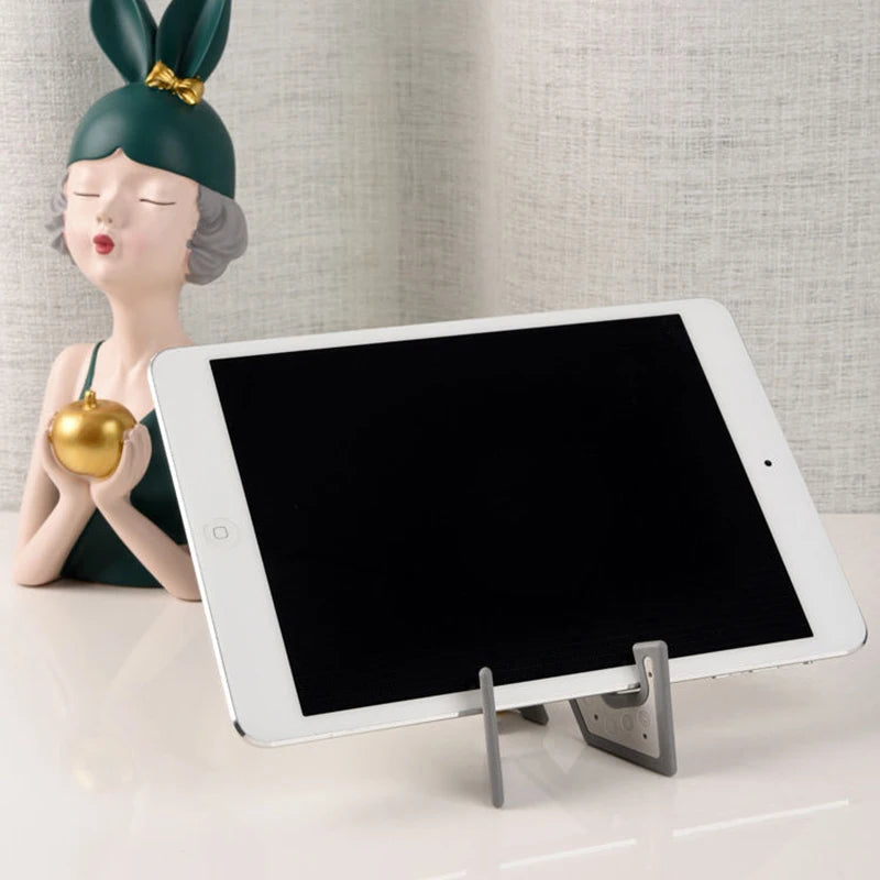 Tiltvo stand holding a small tablet